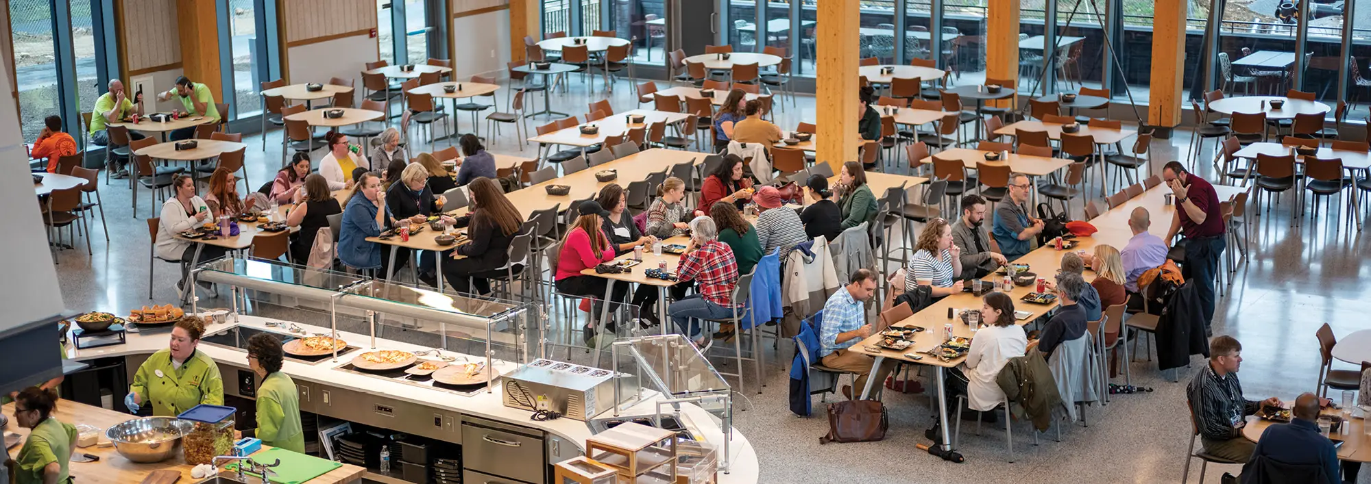 Overhead view of dining room area with faculty and students dining