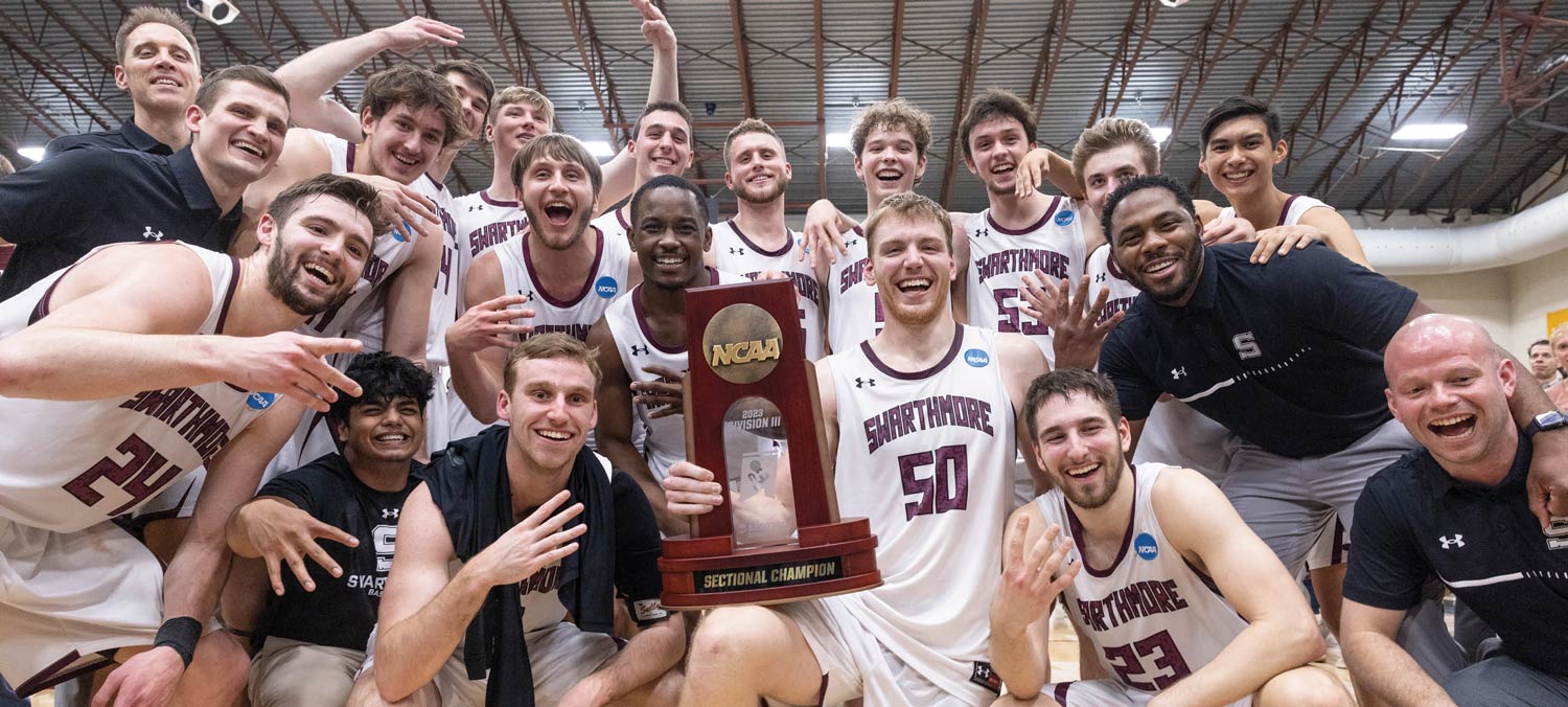 Swarthmore mens basketball team celebrating with a trophy