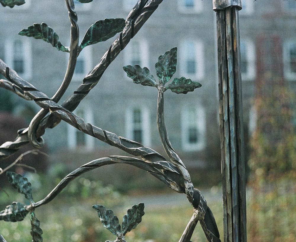close up of iron molded to look line vines and branches