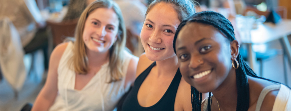 three students posing for a picture